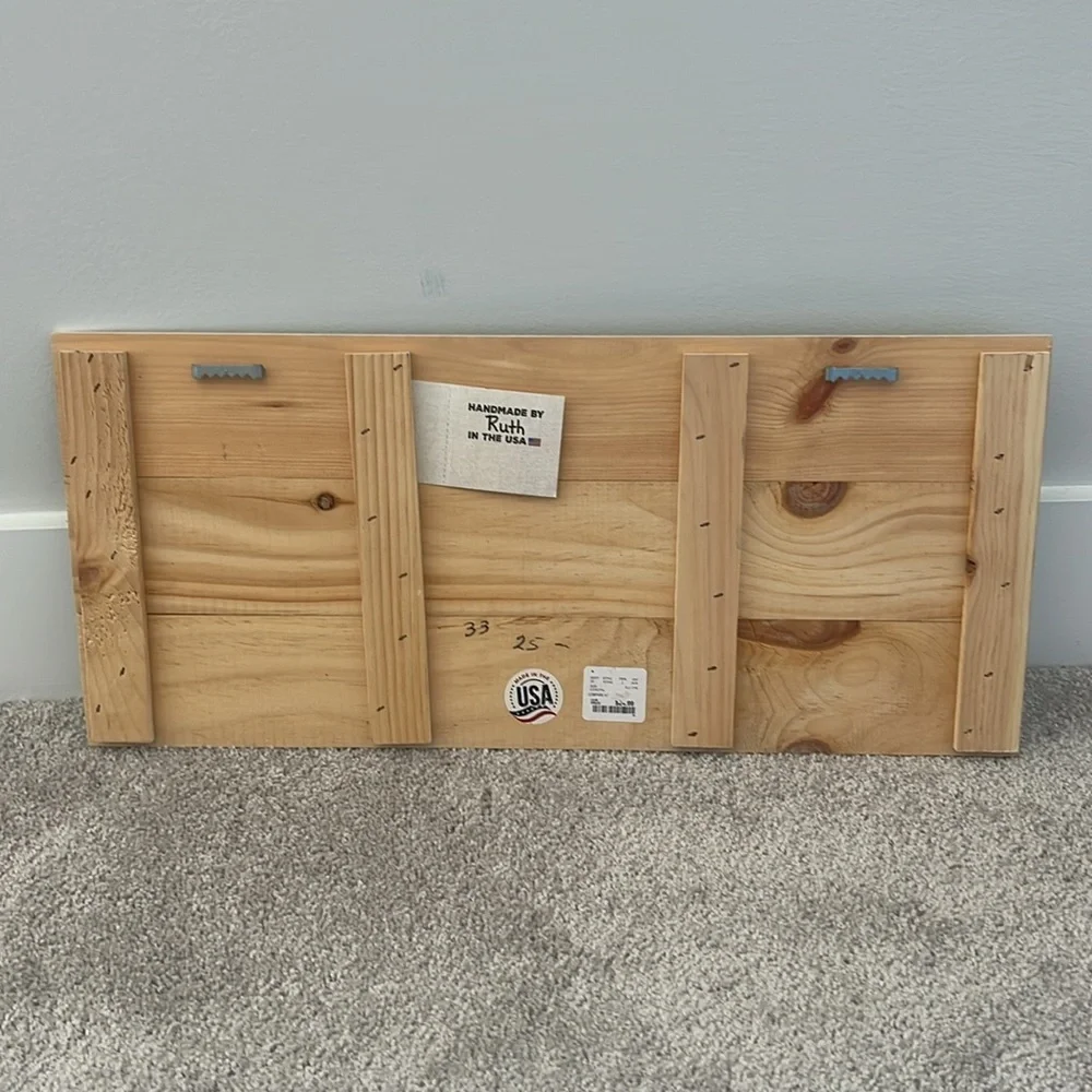 Wooden towels and trunks sign